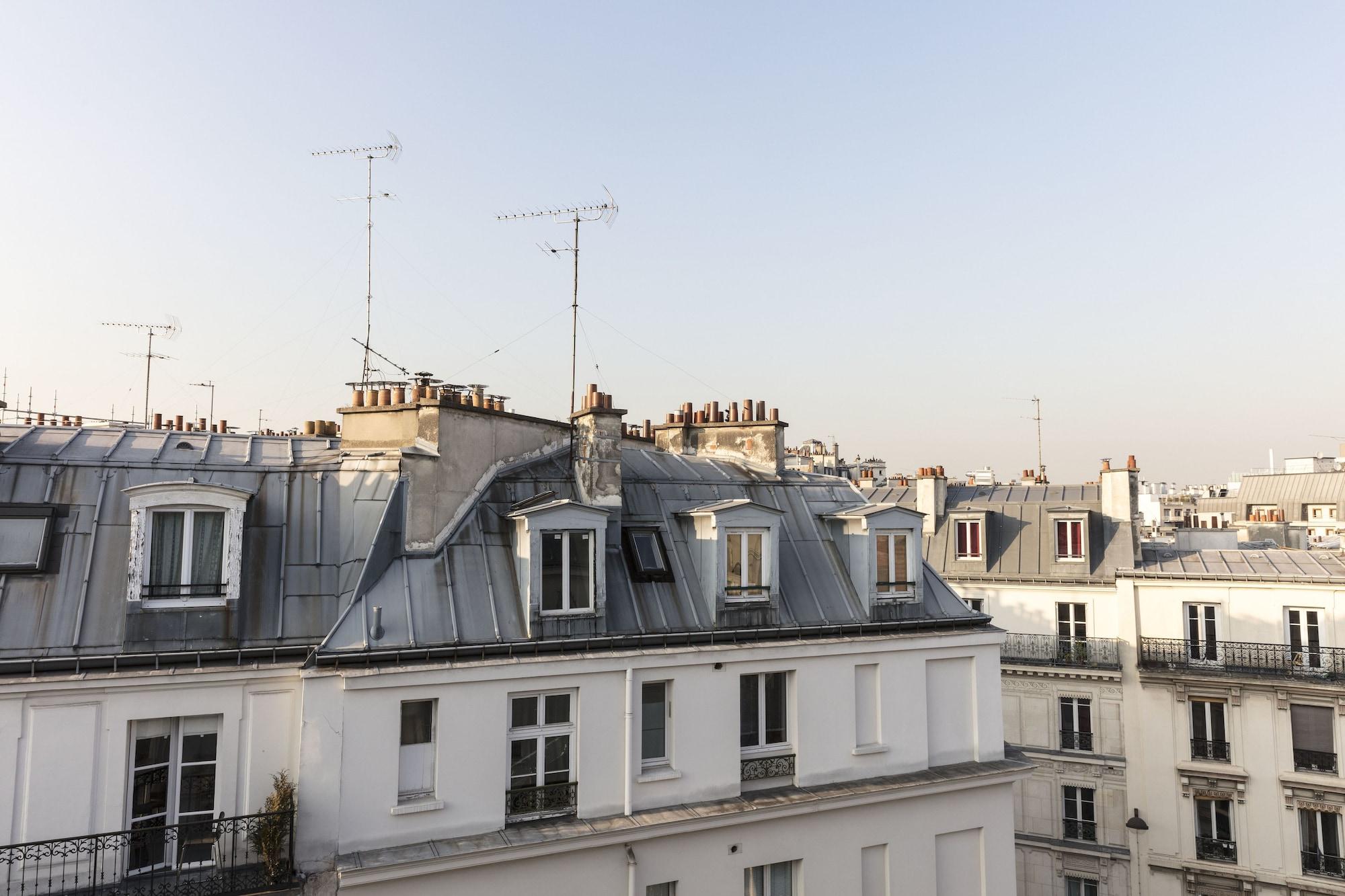 Maison Bréguet Parigi Esterno foto The roofs of Paris